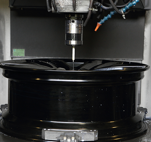 SAI - RMP60 performing in-line measurement for wheel rim production.